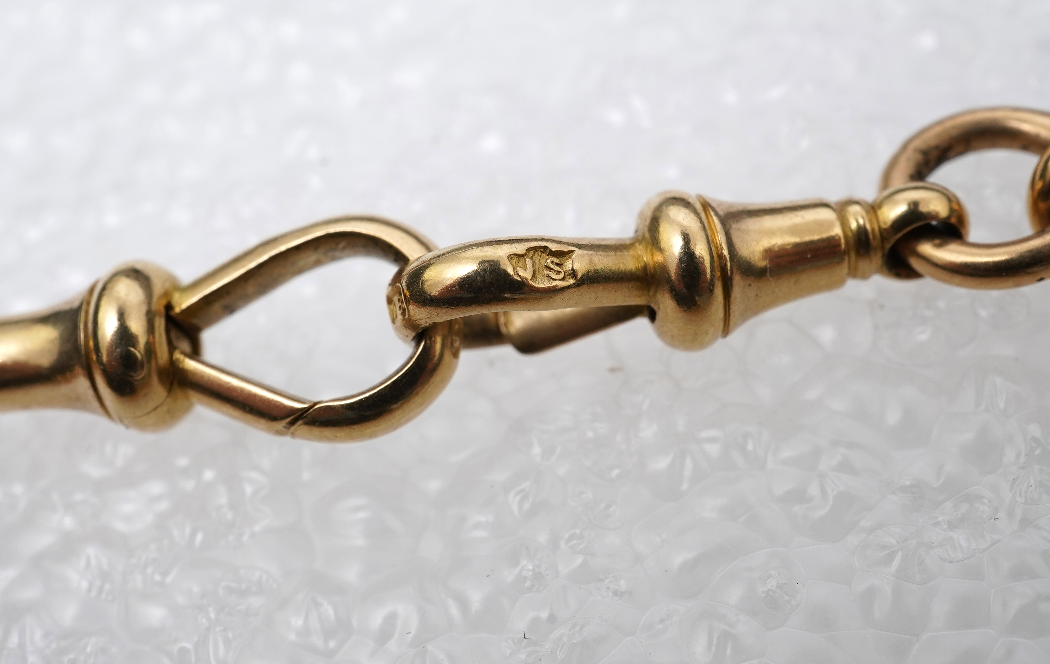 A Victorian 18ct gold watch chain, circa 1886